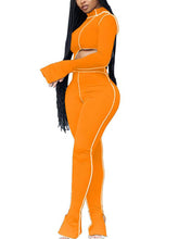 Zweiteiliges Cutout-Oberteil, figurbetonte lange Hose
